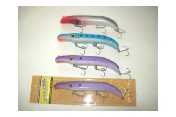 Four fishing lures, three laid out with red, blue, and purple bodies, and one in a yellow packaging, are displayed on a white surface.