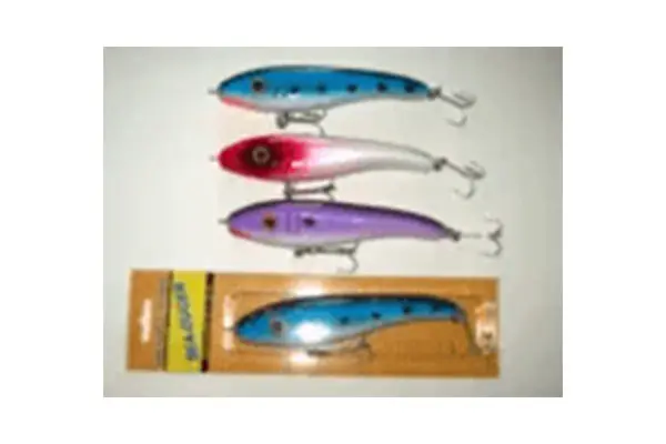 Four fishing lures: three loose in blue, red, and purple colors, and one packaged in yellow.